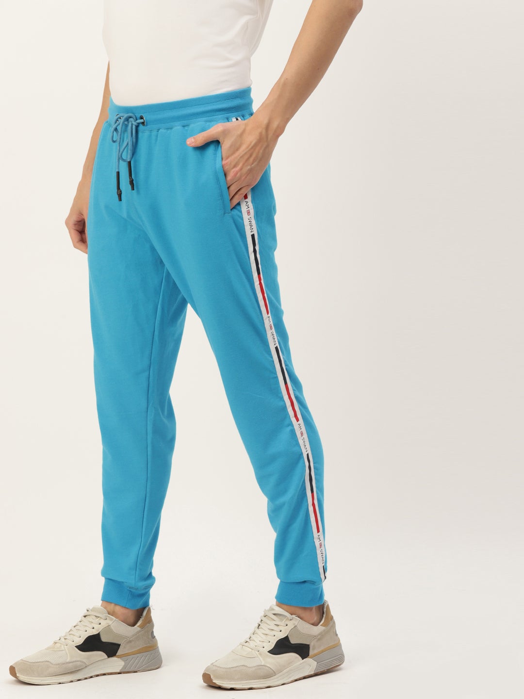 Nike tape best sale track pants mens